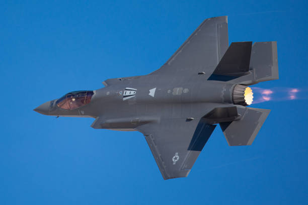 istock Extremely close side view of a F-35 Lightning II    with afterburner on 1212394686