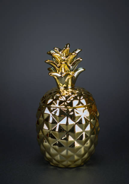 istock ceramic box in the form of pineapple on a black background 1212398533
