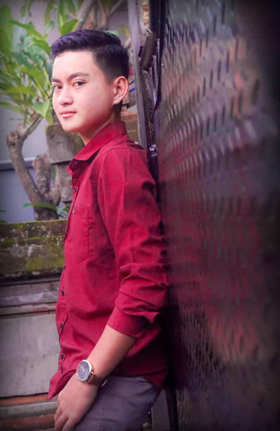 istock Indonesian Teenage Boy is posing for a professional modeling session. 1212400581