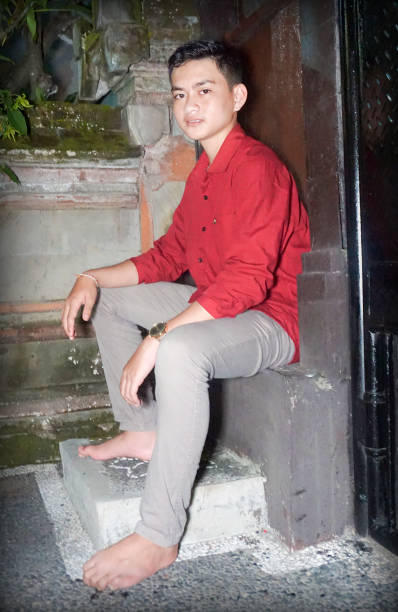 Indonesian Teenage Boy is posing for a professional modeling session.