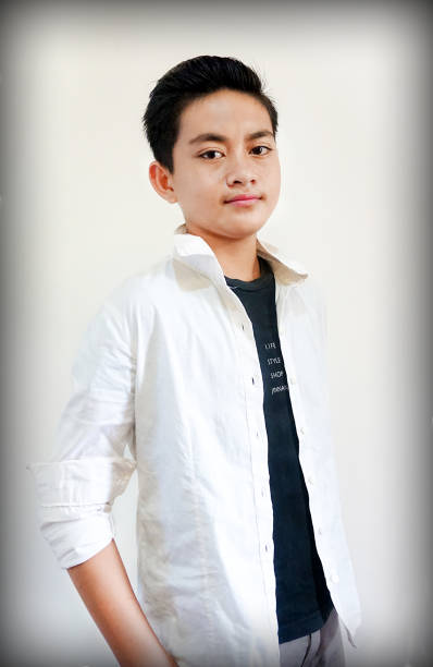 istock Indonesian Teenage Boy is posing for a professional modeling session. 1212400648