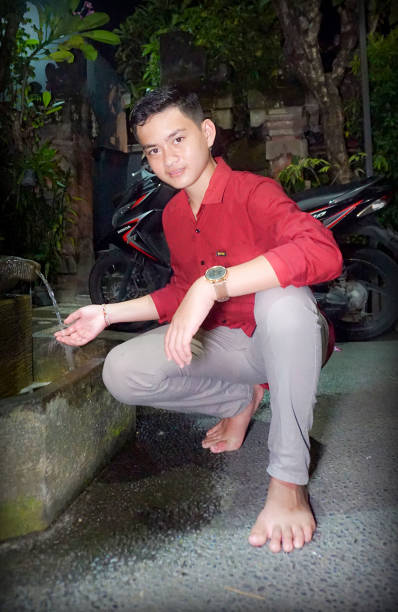istock Indonesian Teenage Boy is posing for a professional modeling session. 1212400650