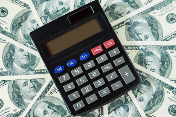 istock Dollar and calculator. Business concept. 1212405004