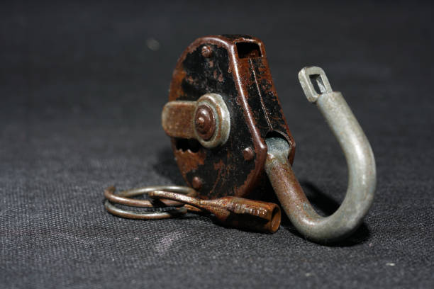 istock Old padlock with rust but fully functional photographed in the studio 1212406064