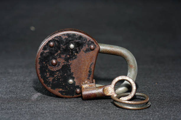 istock Old padlock with rust but fully functional photographed in the studio 1212406073