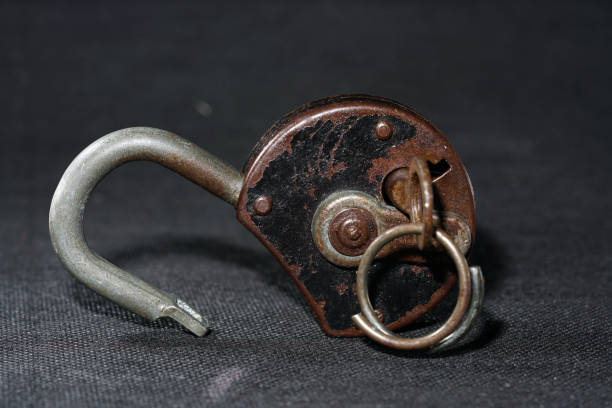istock Old padlock with rust but fully functional photographed in the studio 1212406147