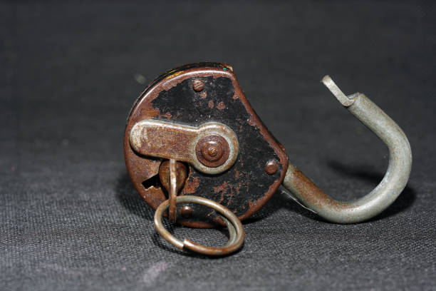 istock Old padlock with rust but fully functional photographed in the studio 1212406217