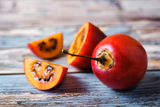 istock Ripe Tamarillo fruit with slices 1212409590