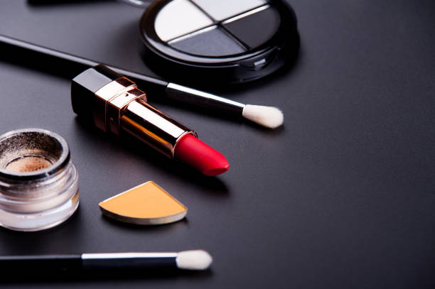istock cosmetic products on a black background 1212413477