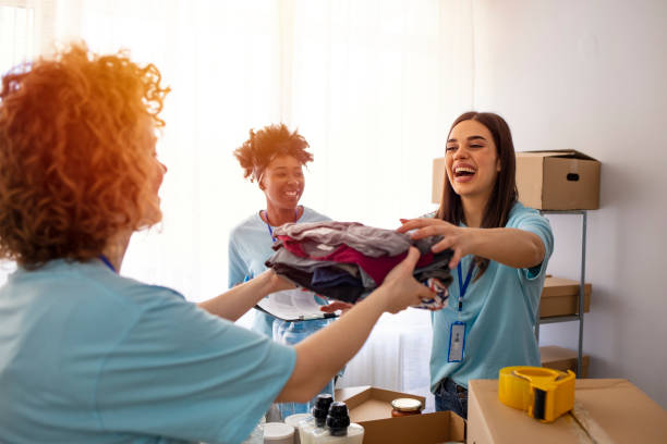 istock Small mixed race group of people working in charitable foundation 1212415946