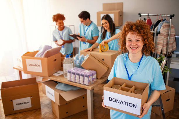 istock Cheerful food drive manager. 1212416054
