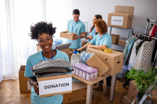 istock Small mixed race group of people working in charitable foundation 1212416969