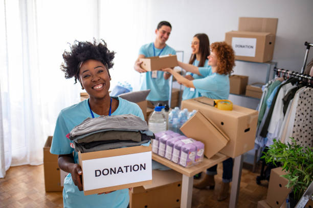 istock Generous people helping to poor people 1212416977