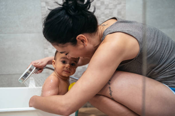 istock Mother and Baby Bathtime 1212419492