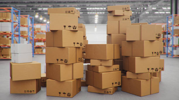 istock 3D Illustration packages delivery, parcels transportation system concept, heap of cardboard boxes in middle of the warehouse. Warehouse with cardboard boxes inside on pallets racks. Huge warehouse. 1212420573