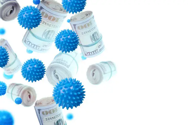 Business hype on coronavirus concept. Photo Collage of dollar bill rolls, and coronavirus miniatures flying in midair.