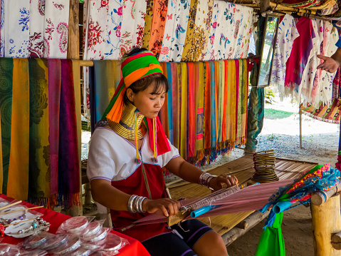 Pattaya, Thailand - January 6, 2020: Kayan woman in the Padaung Tribe Village of Long Neck Women.