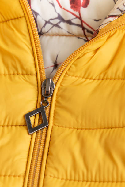 istock Crop view of yellow down jacket 1212423919