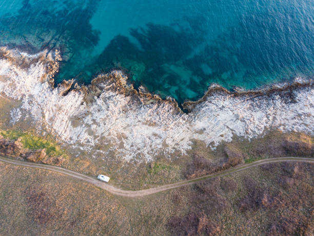 Car parked near the sea from above