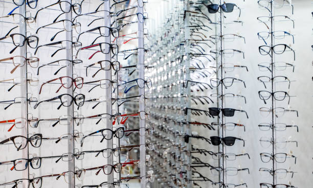 istock Glasses on display on wall in store. 1212426709