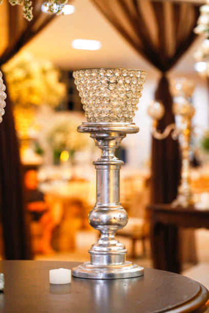 istock light chandeliers and decorative candles on defocused background 1212431362