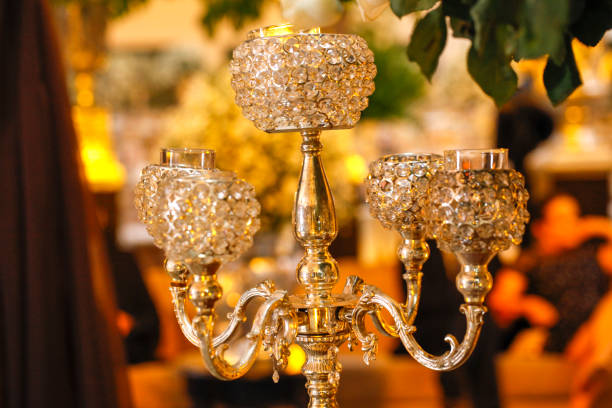 istock light chandeliers and decorative candles on defocused background 1212431393