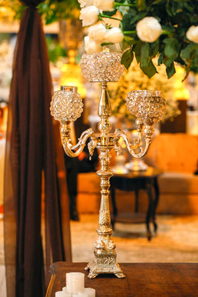 istock light chandeliers and decorative candles on defocused background 1212431439