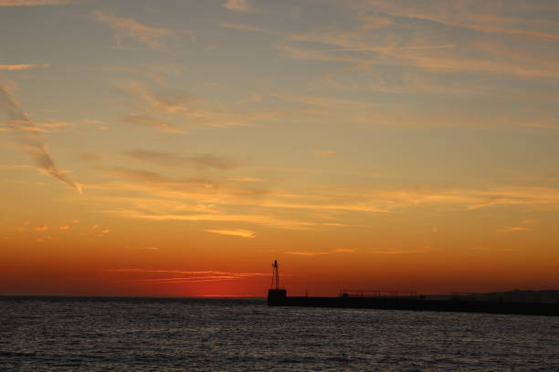 istock A watchtower silhouette in beautiful sunset colors. 1212433278