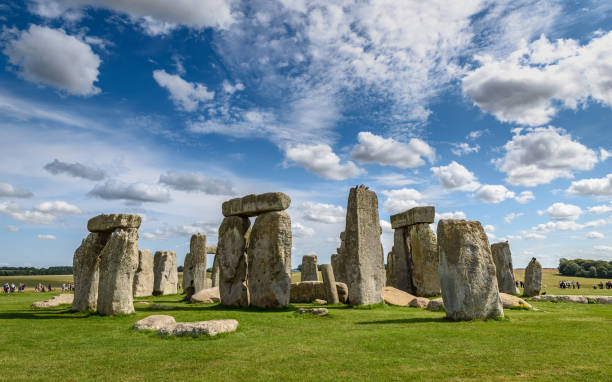 istock Stonehenge under a bright blue sky with high clouds 1212435451