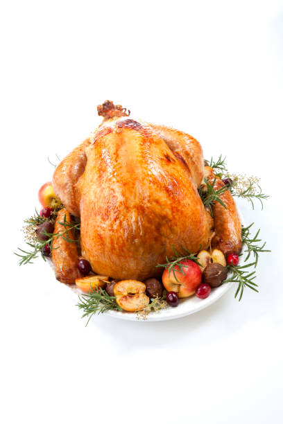 istock Roasted Turkey with Grab Apples over white 1212436672