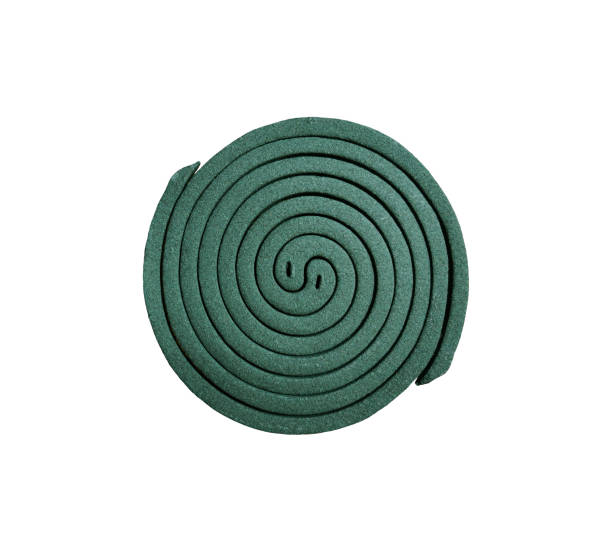 Spiral green Mosquito repellent coil isolated on white background Top view of Mosquito coil isolated on white background. Group of Mosquito repellent coil cutter insect repellant stock pictures, royalty-free photos & images