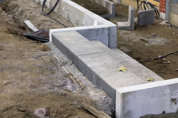 istock Construction site, crafts, Laying new concrete stairs in black 1212438334