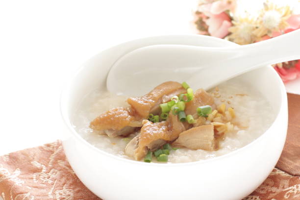 istock Soy sauce chicken on Chinese congee 1212438474
