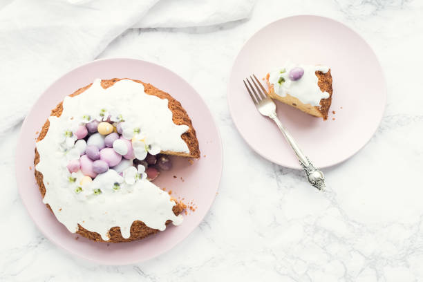 istock Glazed easter cake with flowers and candy 1212441051