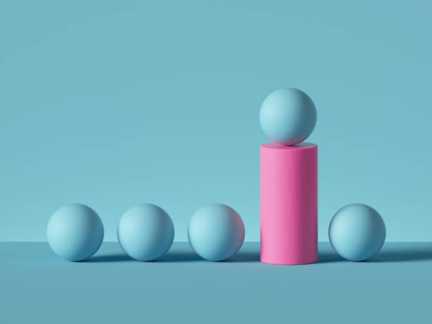 istock 3d render, abstract minimal geometric background. Blue balls, pink cylinder podium. Isolated objects, primitive shapes. Successful business concept, one of a kind, advantage metaphor. 1212442903