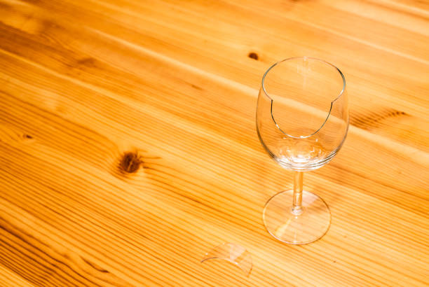istock A chip on the rim of wine glass from front side 1212452493