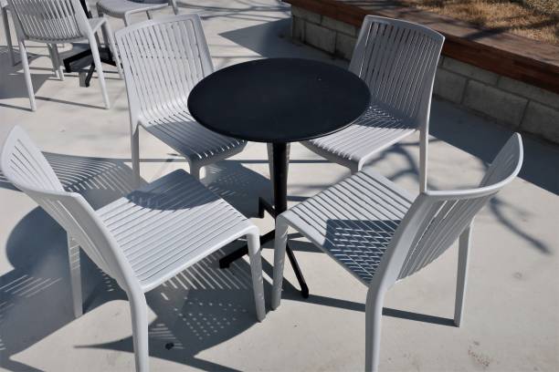 istock a round table of plastic material in the garden 1212453319