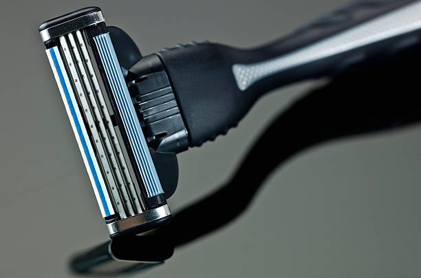 Brand new male razor gray and blue color  blade stock pictures, royalty-free photos & images