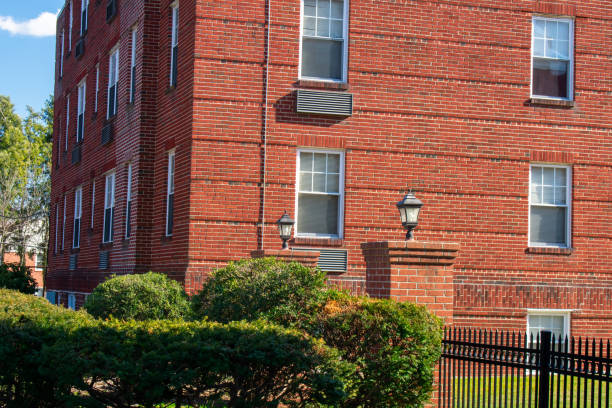 istock A Red Brick Apartment Building With Windows 1212464214