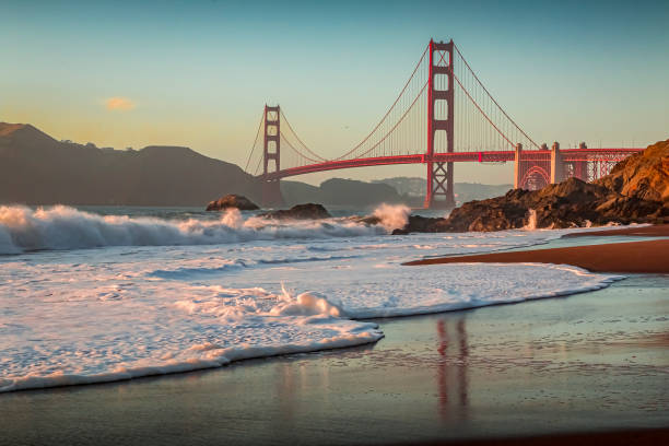 istock Golden Gate Bridge in San Francisco from Baker Beach at sunset 1212467531