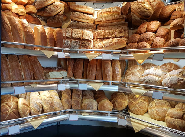 istock breads and begels on bakery front store in greece 1212467606