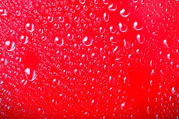 istock Backgrounds Condensation Red Raindrop Water Wet 1212467625