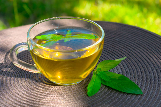 istock A cup of mint tea with mint leaves . 1212469736