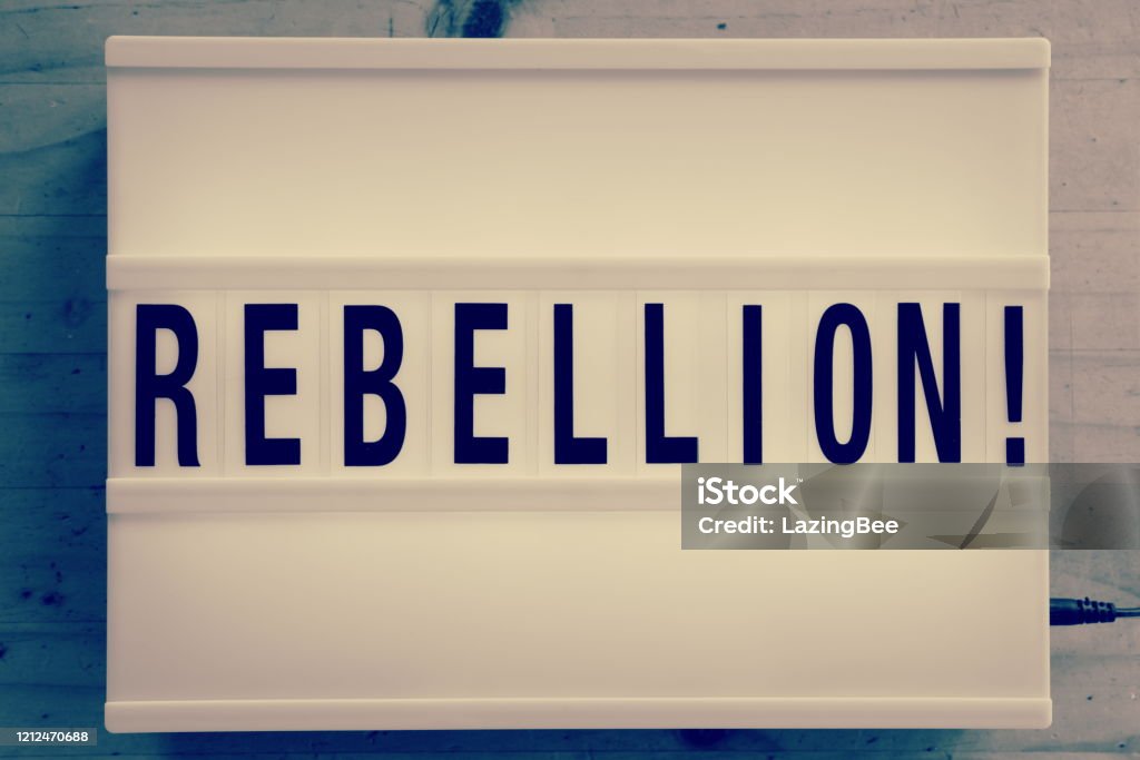 Rebellion in Light Box Trend Word 'Rebellion' in a Light Box Trend for a Protest Theme. Activist Stock Photo