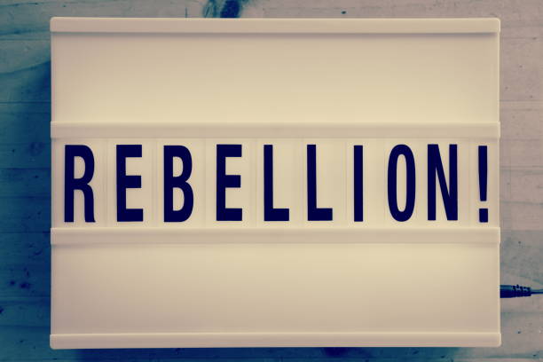 Rebellion in Light Box Trend Word 'Rebellion' in a Light Box Trend for a Protest Theme. extinction rebellion photos stock pictures, royalty-free photos & images
