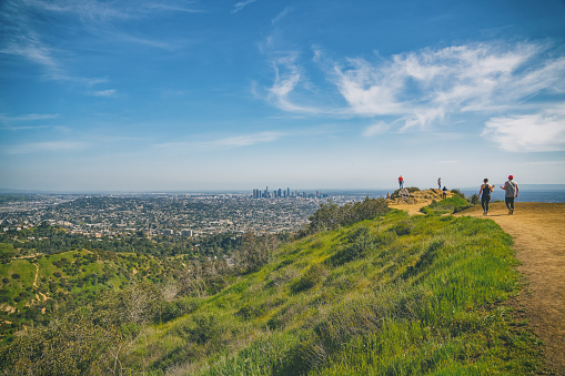 Griffith Hills Park at sunset, and panoramic view of Los Angeles city from Hollywood Hills. Los Angeles, California/USA - April 8, 2018
