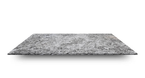 istock Empty concrete shelves table isolated on white background. For product display or design 1212472268