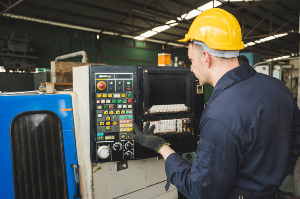 istock Industrial workers are working on projects in large industrial plants with many devices. 1212474654