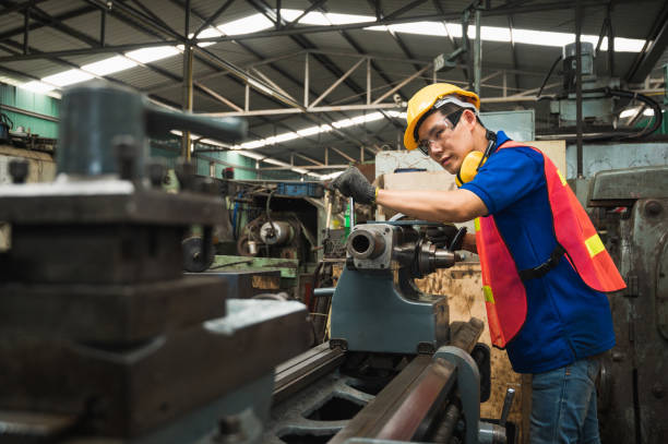 istock Asian Industrial workers are working on projects in large industrial plants with many devices. 1212474813