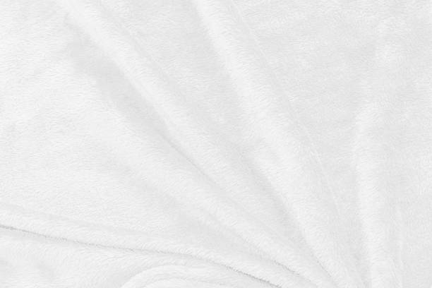 istock White fabric texture for wallpaper, Abstract cloth background with soft waves 1212476385